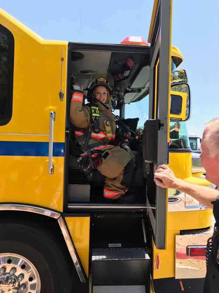 firetruck volunteer firefighter woman