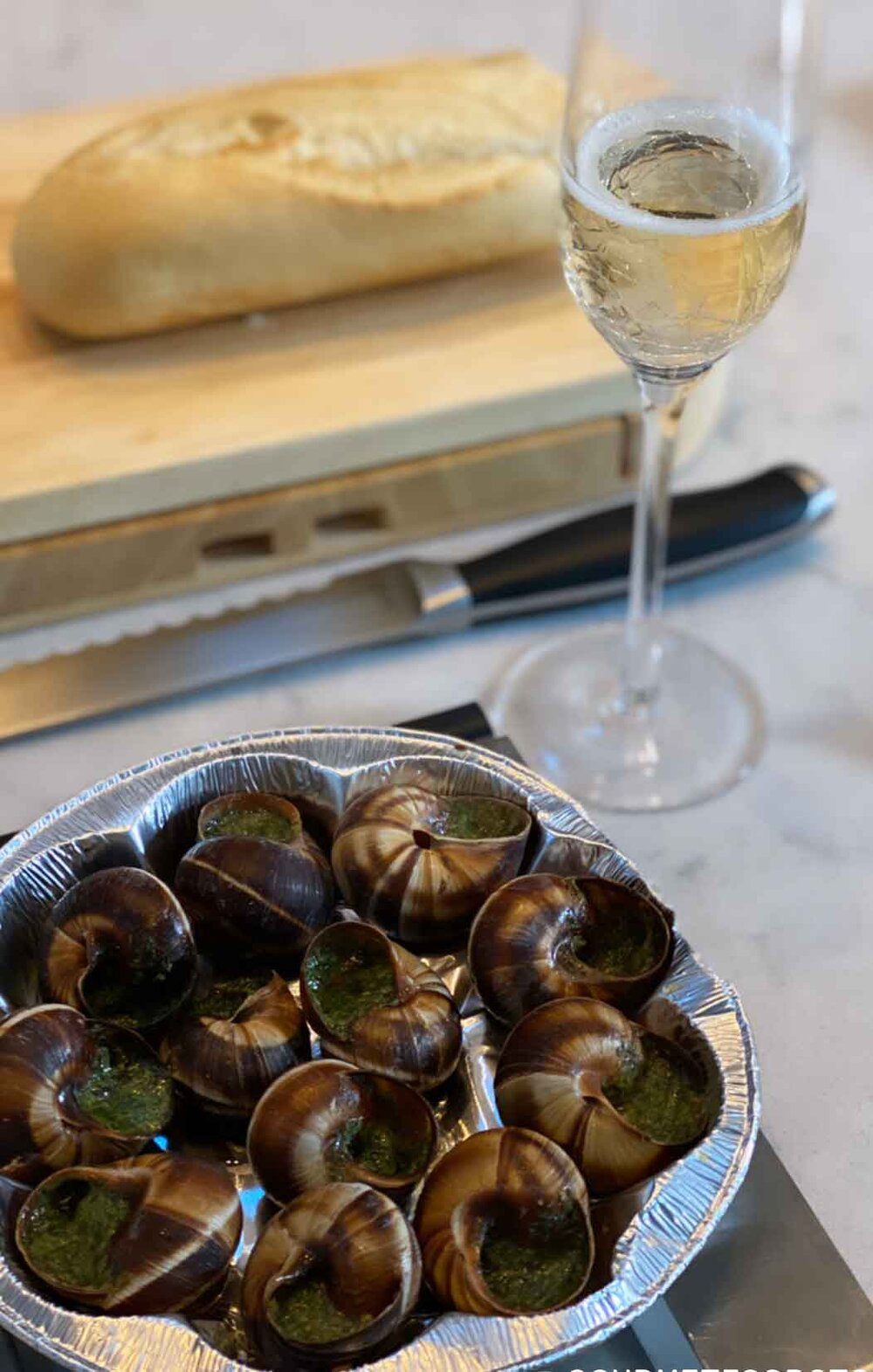 productive things to do at home try new recipe escargot, champagne and french baguette