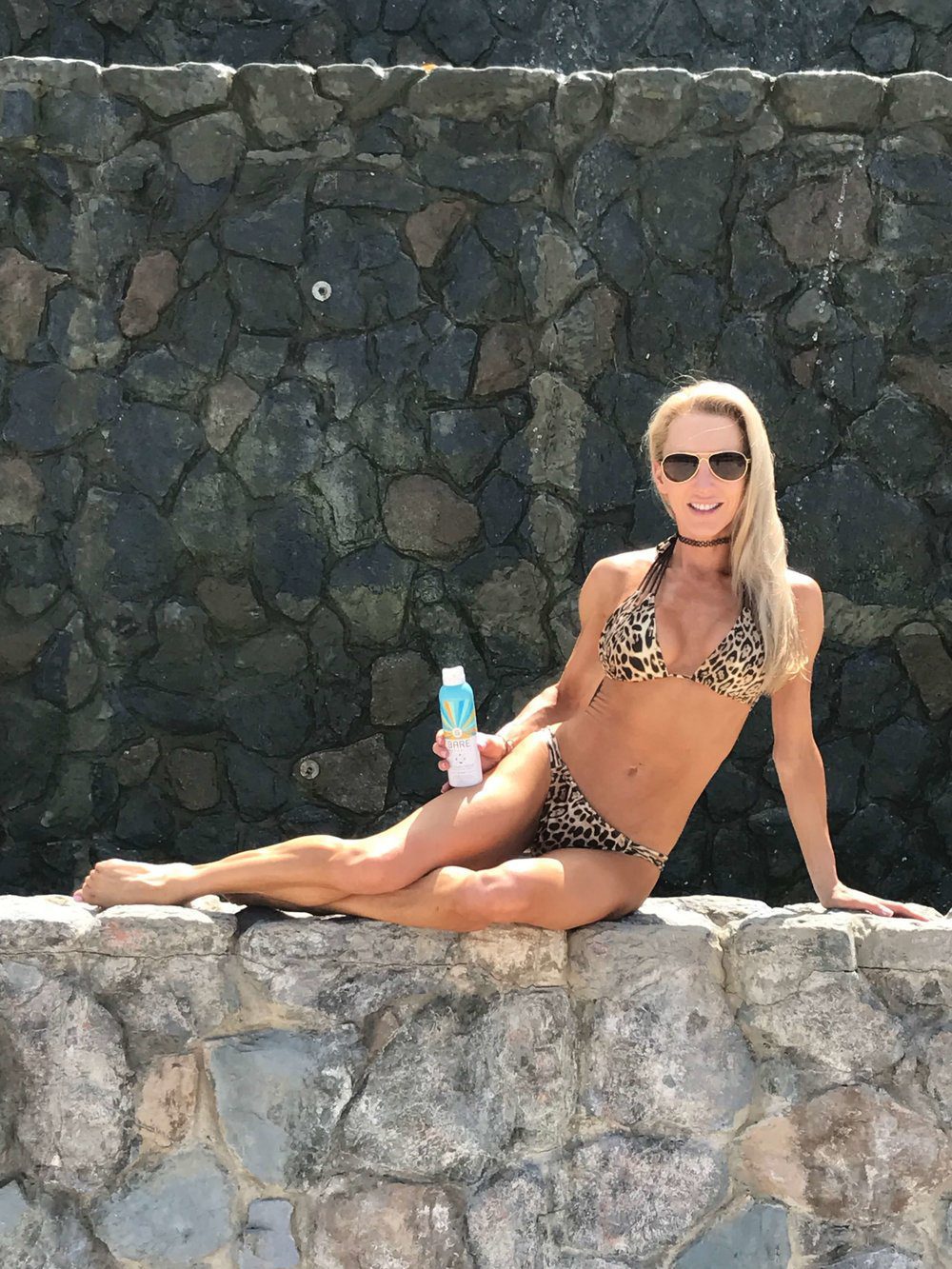 Best cruelty-free sunscreen Bare Republic Clearscreen® SPF 50 Sport Sunscreen Spray bikini model St Thomas.
