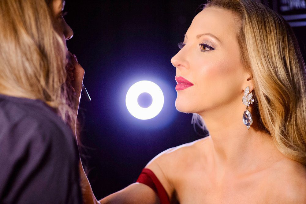 matte red lipstick beauty blogger Eve Dawes applying makeup