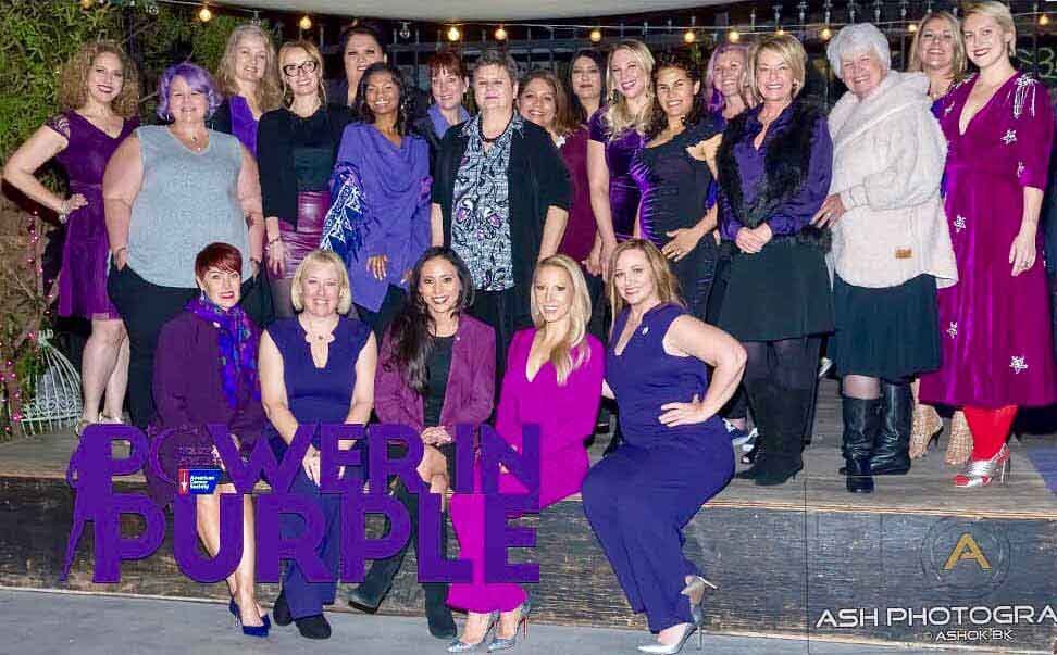 women cancer advocates wearing purple