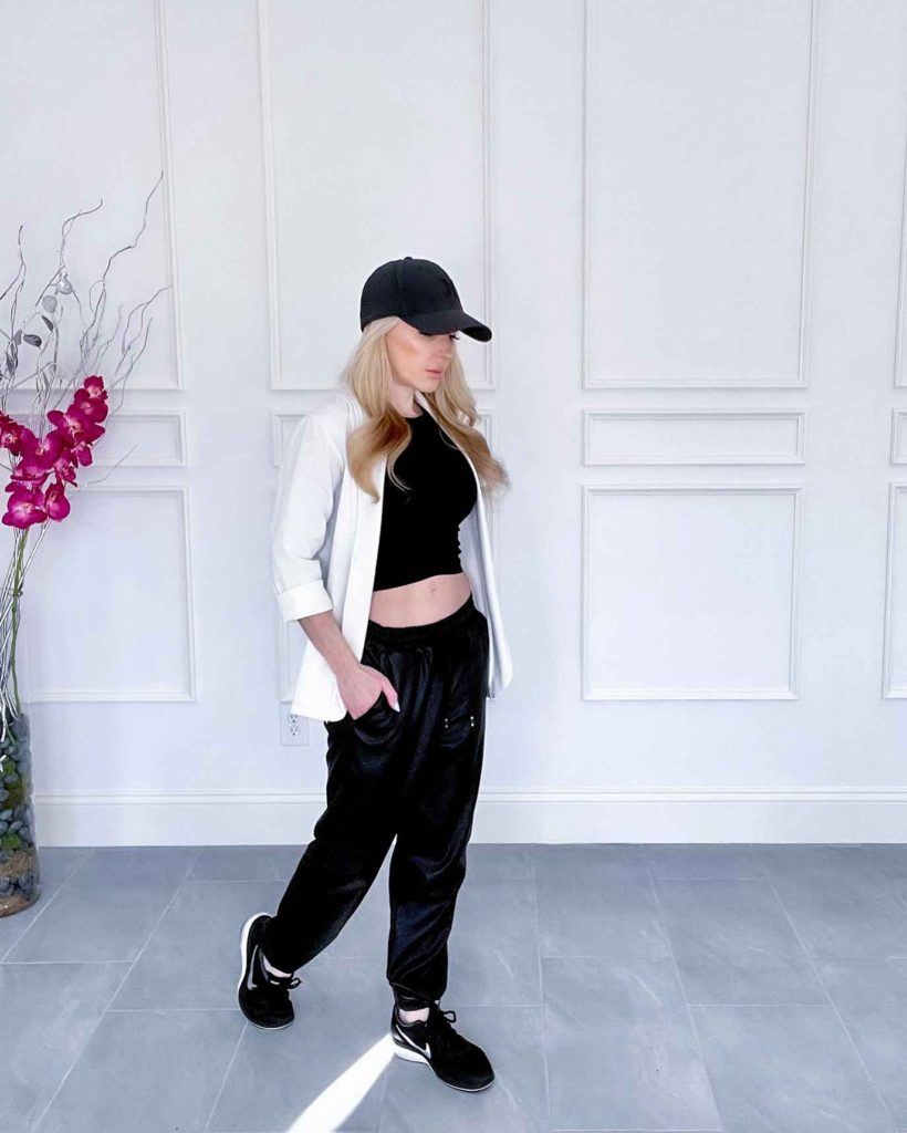 luxe athleisure outfit black joggers faux leather