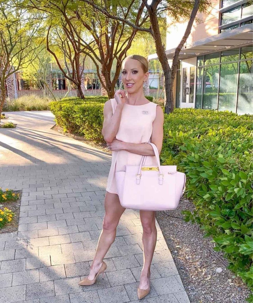 pink romper Versace bag monochromatic outfit summer fashion 2023