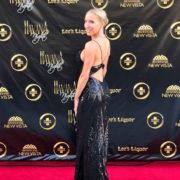 glam makeup golden glow red carpet blonde Eve Dawes wearing Faviana gown