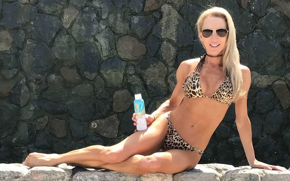 SPF sunscreen blonde bikini model Eve Dawes