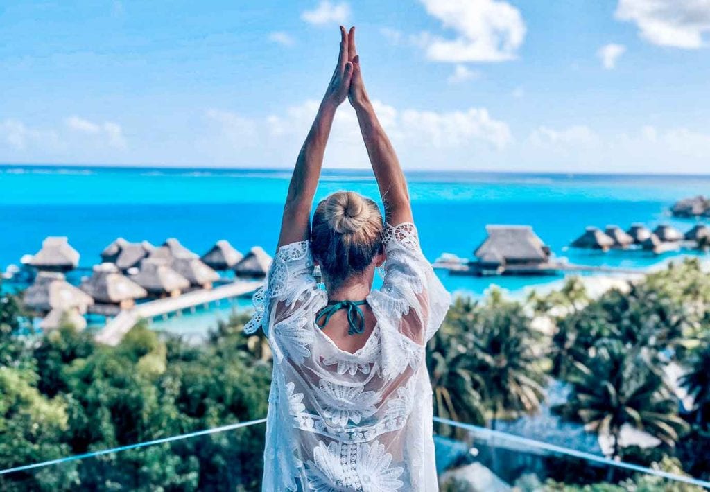 Conrad Bora Bora spa view woman yoga pose