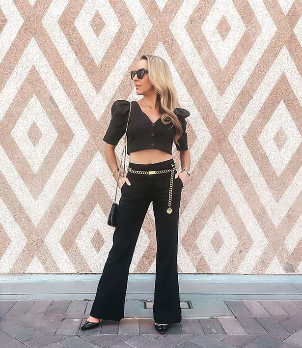 best wide leg pants black Chanel chain belt outfit glamour gains
