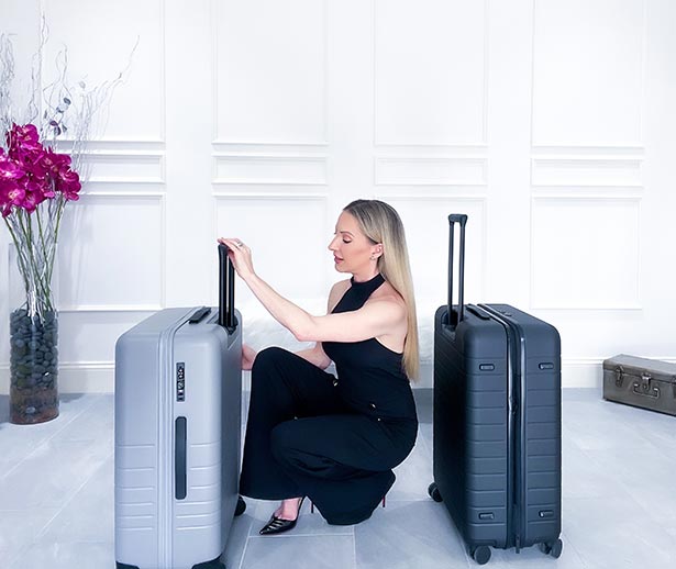 Travel blogger Eve Dawes reviewing Away luggage Monos case medium