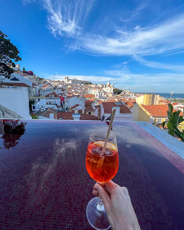 best infinity rooftop pools Lisbon Memmo Alfama hotel city river views