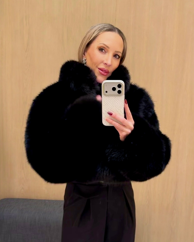 best faux fur jacket ALO black cropped worn by Eve Dawes
