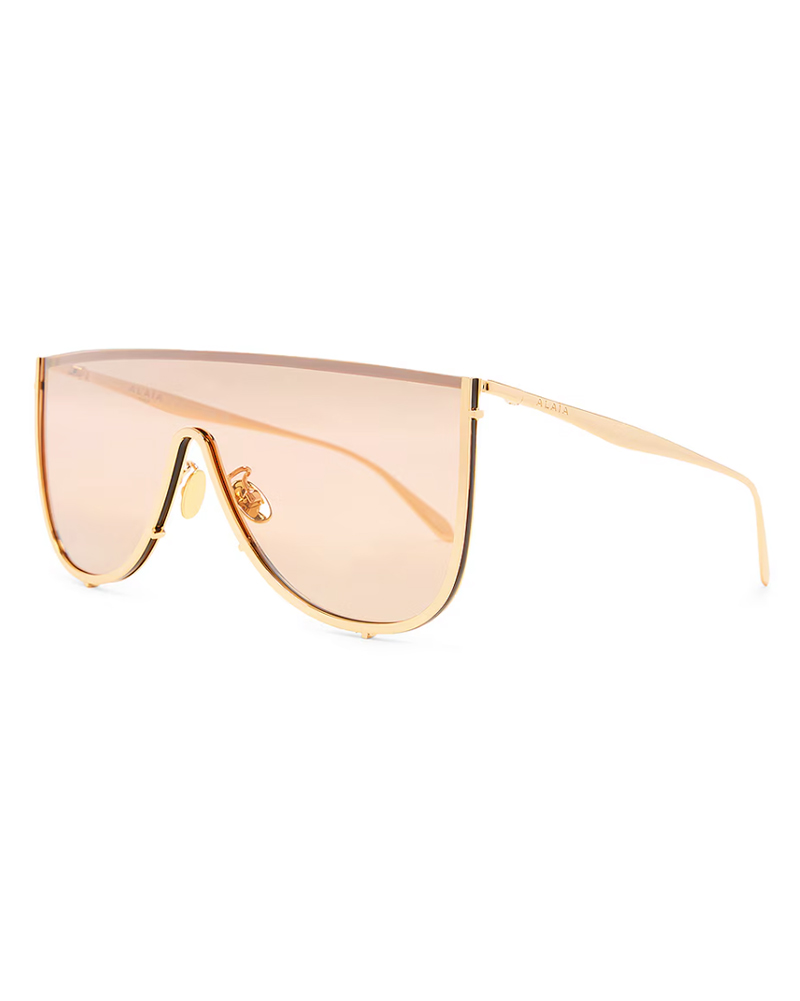 sunglasses trends 2026 womens shield sunglasses brown gold