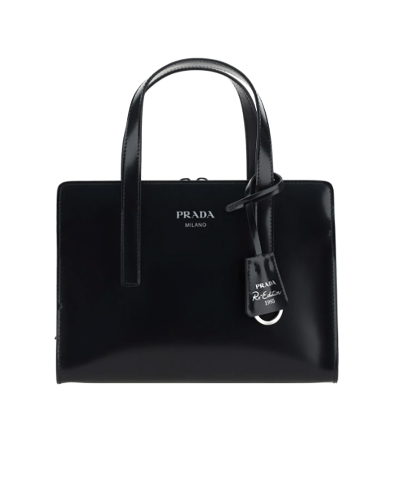prada re-edition 1995 black leather trending bag