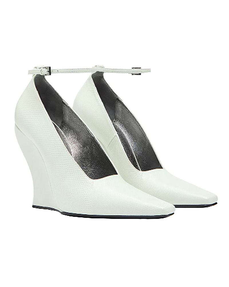 wedges still in style 2026 Alaia wedge pumps white