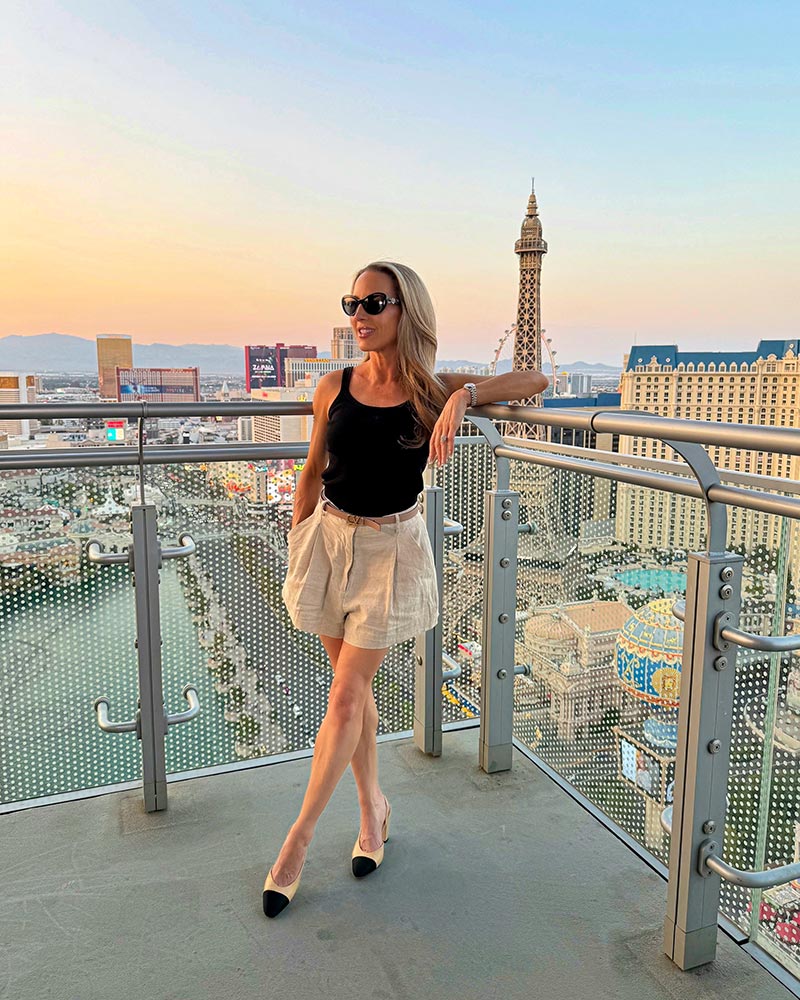 chanel slingbacks in style summer outfit black tank tan shorts
