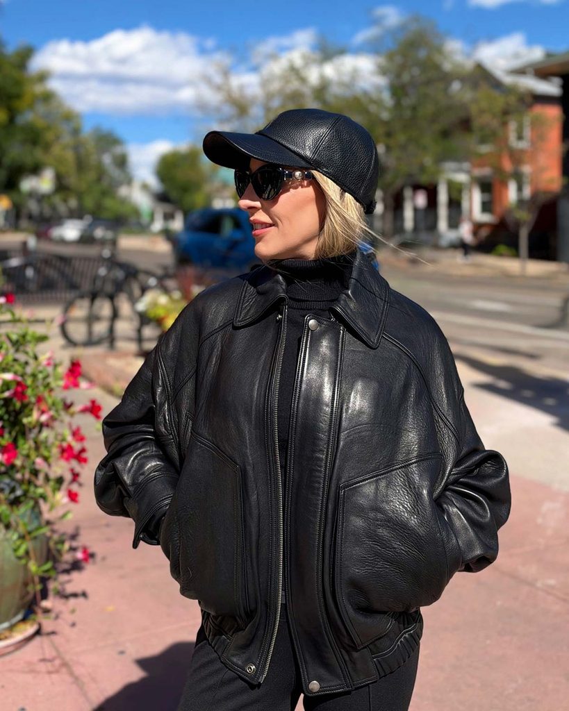 Eric Javits women's black leather baseball cap worn by Eve Dawes