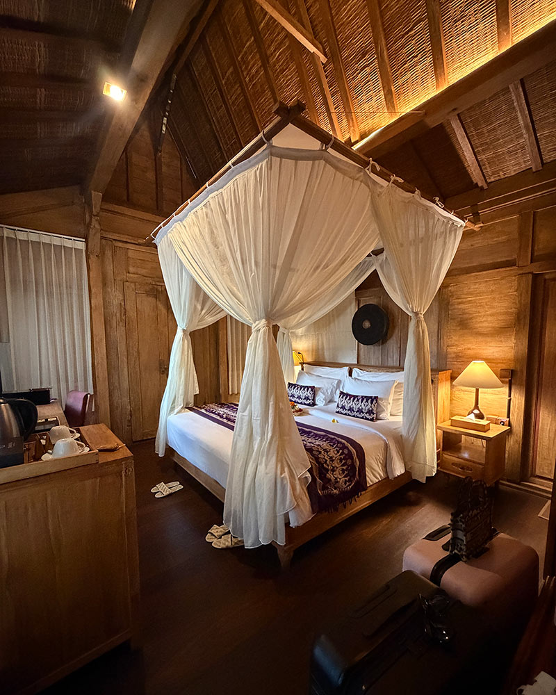 Pramana Watu Kurung review wooden pool villa living room