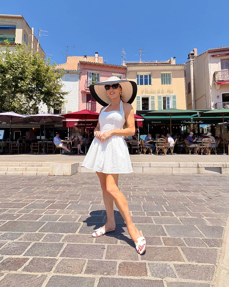 What to wear with a white mini dress and cotton hat in the South of France?