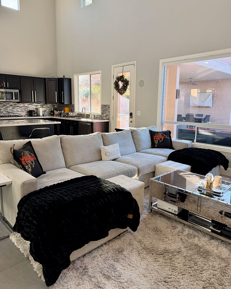 lola blankets black large styled in modern living room