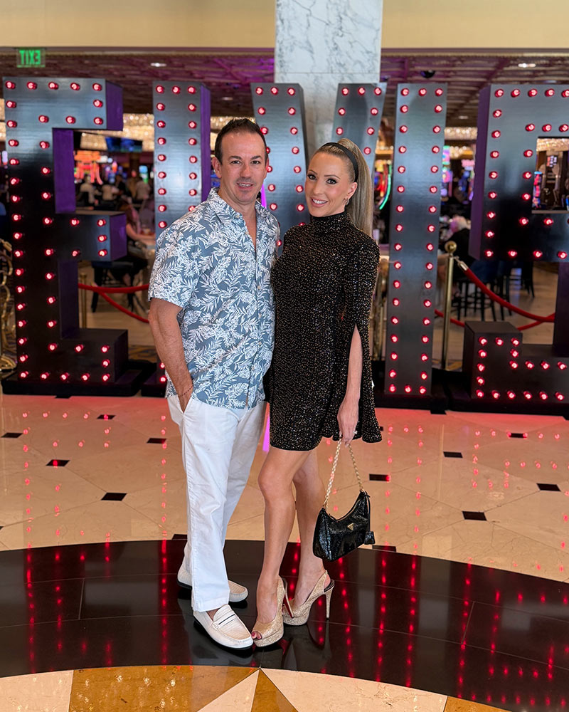 Prada sequin bag black gold on Eve Dawes fashion editor Glamour and Gains at Elvis concert Las Vegas