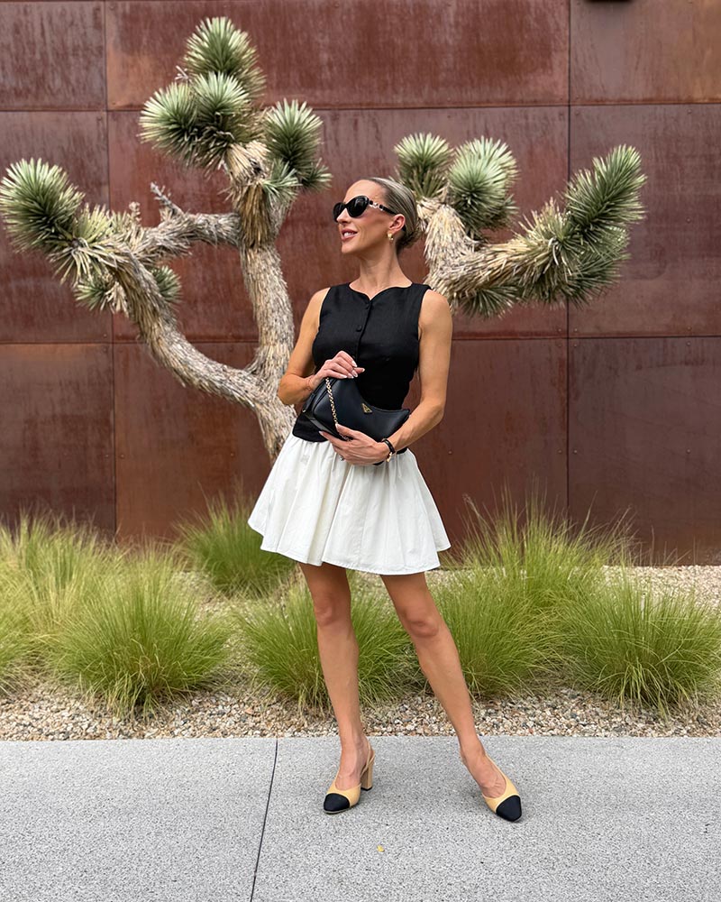 stone cold fox dress black and white mini styled with Prada bag and Chanel heels