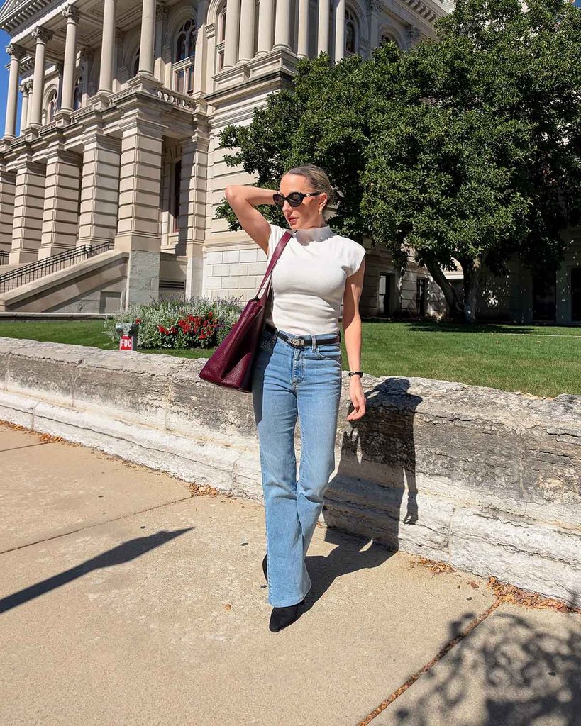 sasha therese white top and jeans worn by Eve Dawes